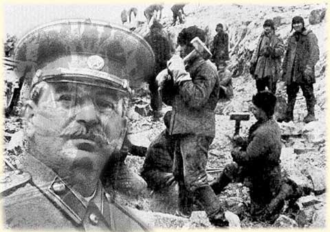 An image of Iósiv Stalin is superimposed on a photograph of a forced labor camp